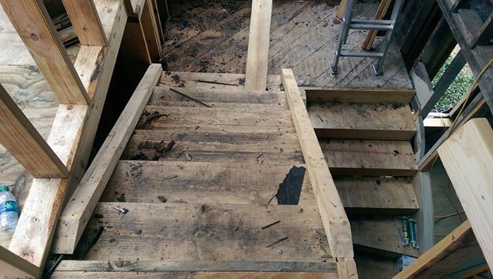 From floor to ceiling, this beautiful centennial home didn't have much left standing. We gutted the entirety of the home looking for all pieces that needed to be removed. This image shows one of its stairs cases that we had to rebuild. We worked closely with this customer to restore the home back to its original design including this staircase.