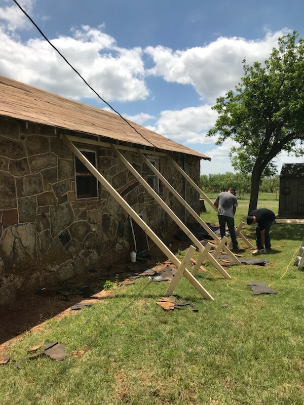 Our team is utilizing "bracing" to provide support around this structure. Due to the age of the home, this is merely a precautionary measure. When we remove the roof, the structure will be less stable so we want to provide as much support as possible. This structure has stood for over 73 years - it's not going anywhere on our watch!
