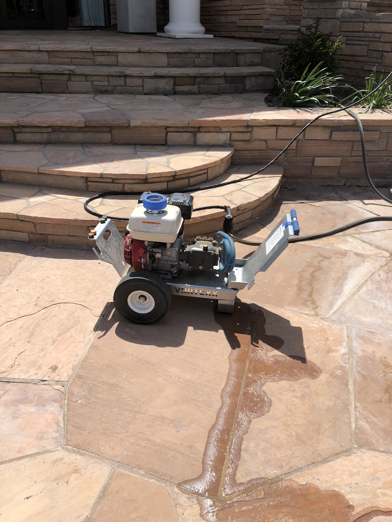 We utilized our pressure sprayer to prepare our flagstone decks prior to installing the Stone Armor product. Pressure washing your deck is a very important step in the installation process. It removes small dust, debris and miscellaneous particles from your deck. This provides a much better bond between the stone and the Stone Armor once applied.