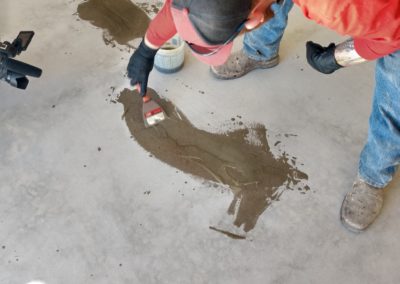 As part of our prepping stage, we carefully assess your garage floors to check for cracks or any signs of distress. Once all of the cracks have been identified, we apply a mixture of Silica Sand & a Mender to seal & repair the cracks.