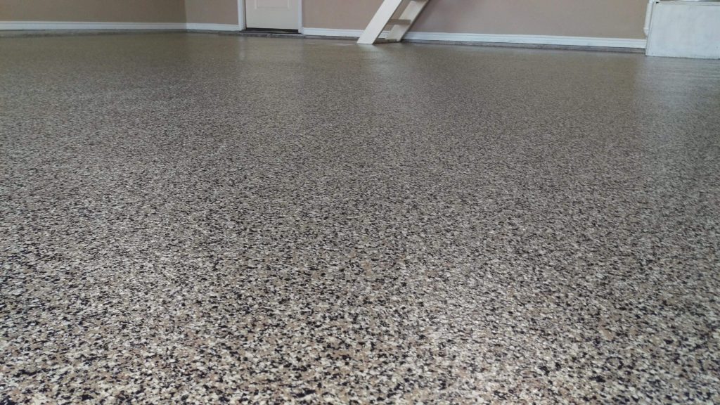 Our 1 Day Coatings product is designed to be installed in as little as one day! This image shows our Chip Flake system installed on a garage floor for superior protection and performance.
