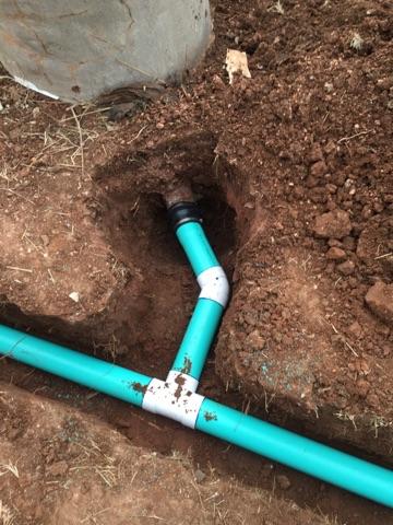 We are tying in a drainage line to help the water flow away from the home and keep the foundation healthy. Alleviating underground water is a great way to protect your homes foundation. It reduces the amount of soil swelling & shrinking from heavy rains and can save thousands in repair cost down the road.