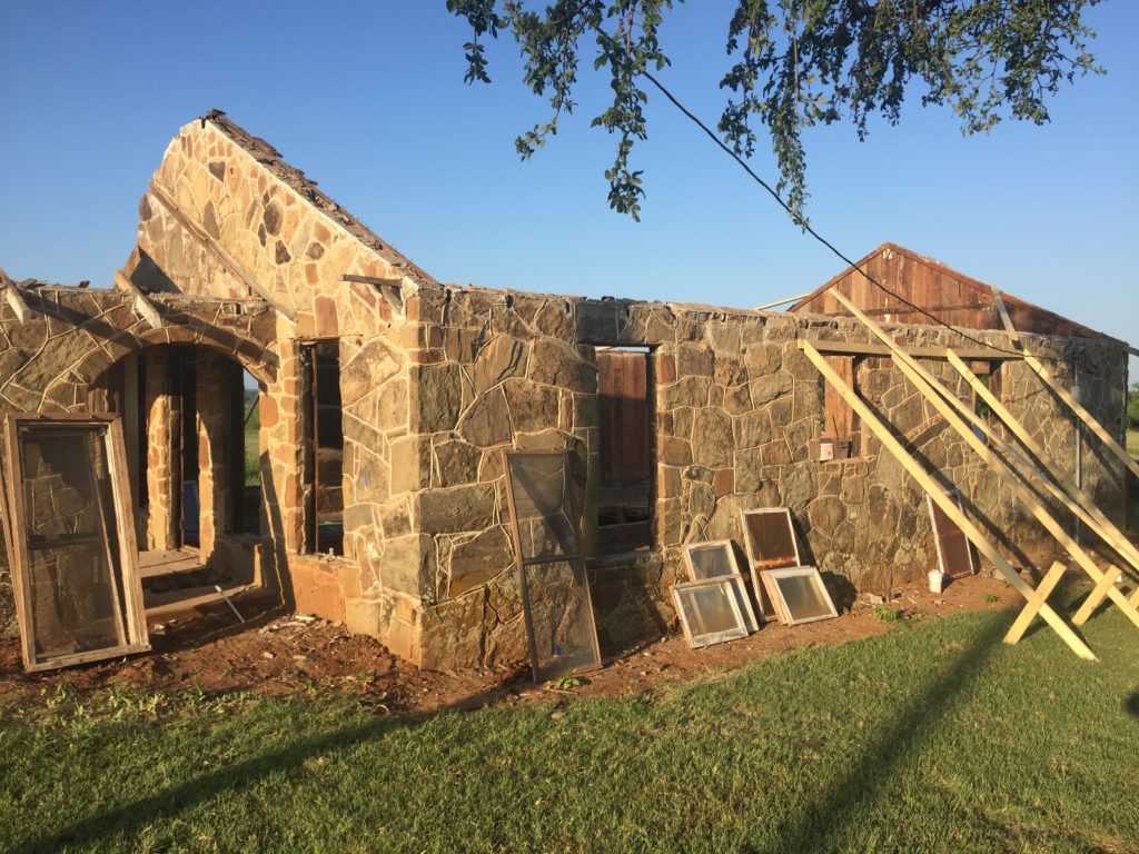 In order to prep this home for our renovation, we needed to remove the aged roof. It was both unsafe for our crew and unable to protect the inside of the home from the outside elements. Therefore, we are constructing a new roof for this beautiful home.